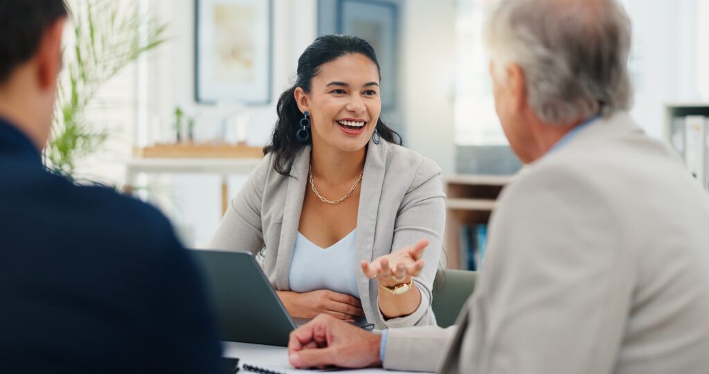 A direct sales professional having a positive meeting with her clients